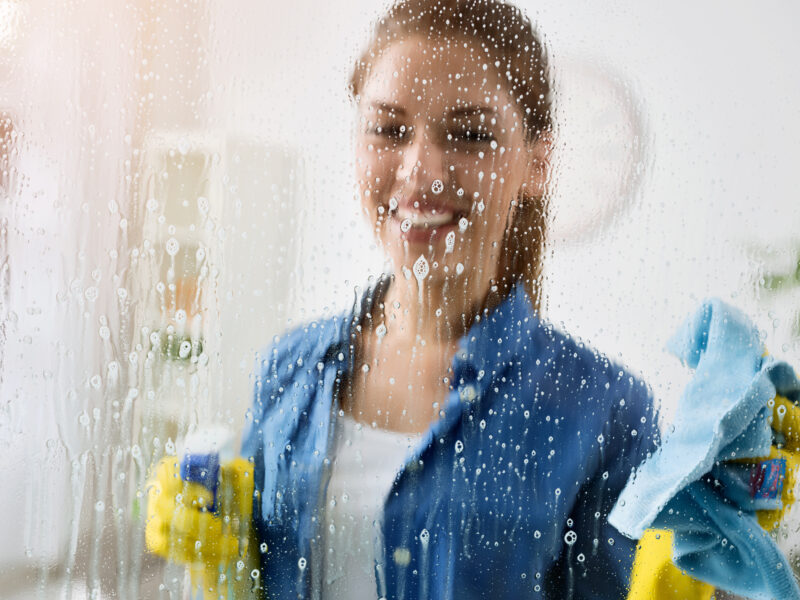 Woman,Cleaning,Window,With,Special,Cleaner